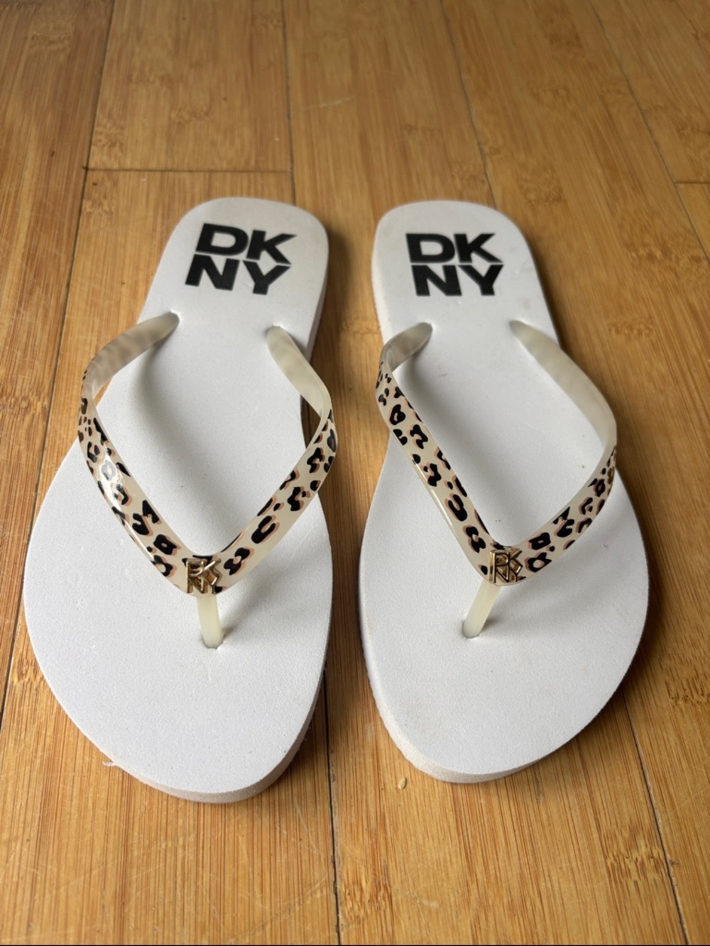 DKNY White Flip Flops with Leopard-Print Straps and Gold Logo